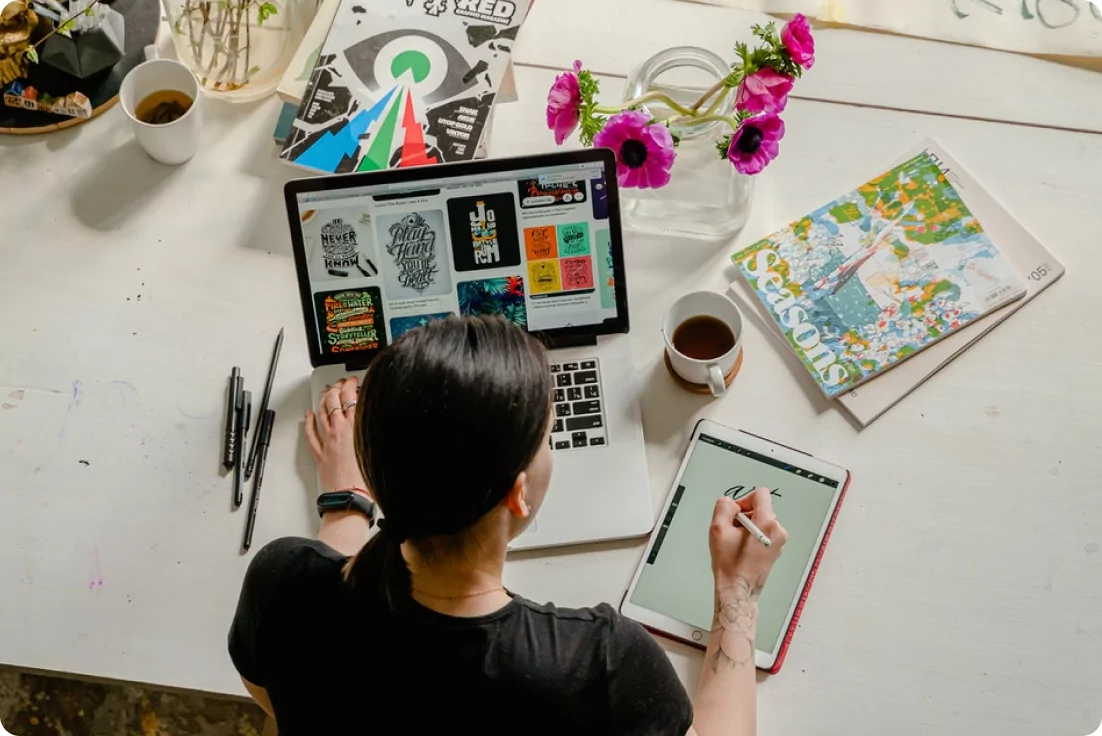 Woman drawing on a tablet